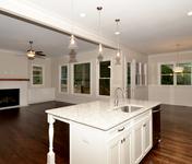 Open kitchen in this Oakhurst plan built by Atlanta Home Builder Waterford Homes